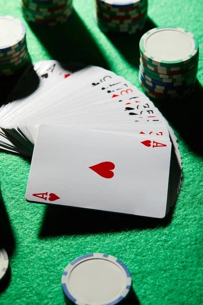 Real dealers manage every hand with professionalism Live dealer dealing cards in baccarat round